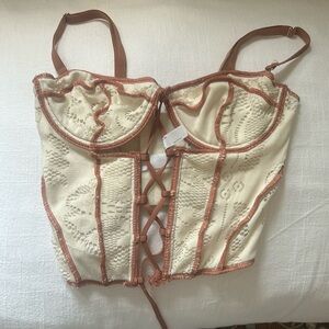 White and brown corset going out too